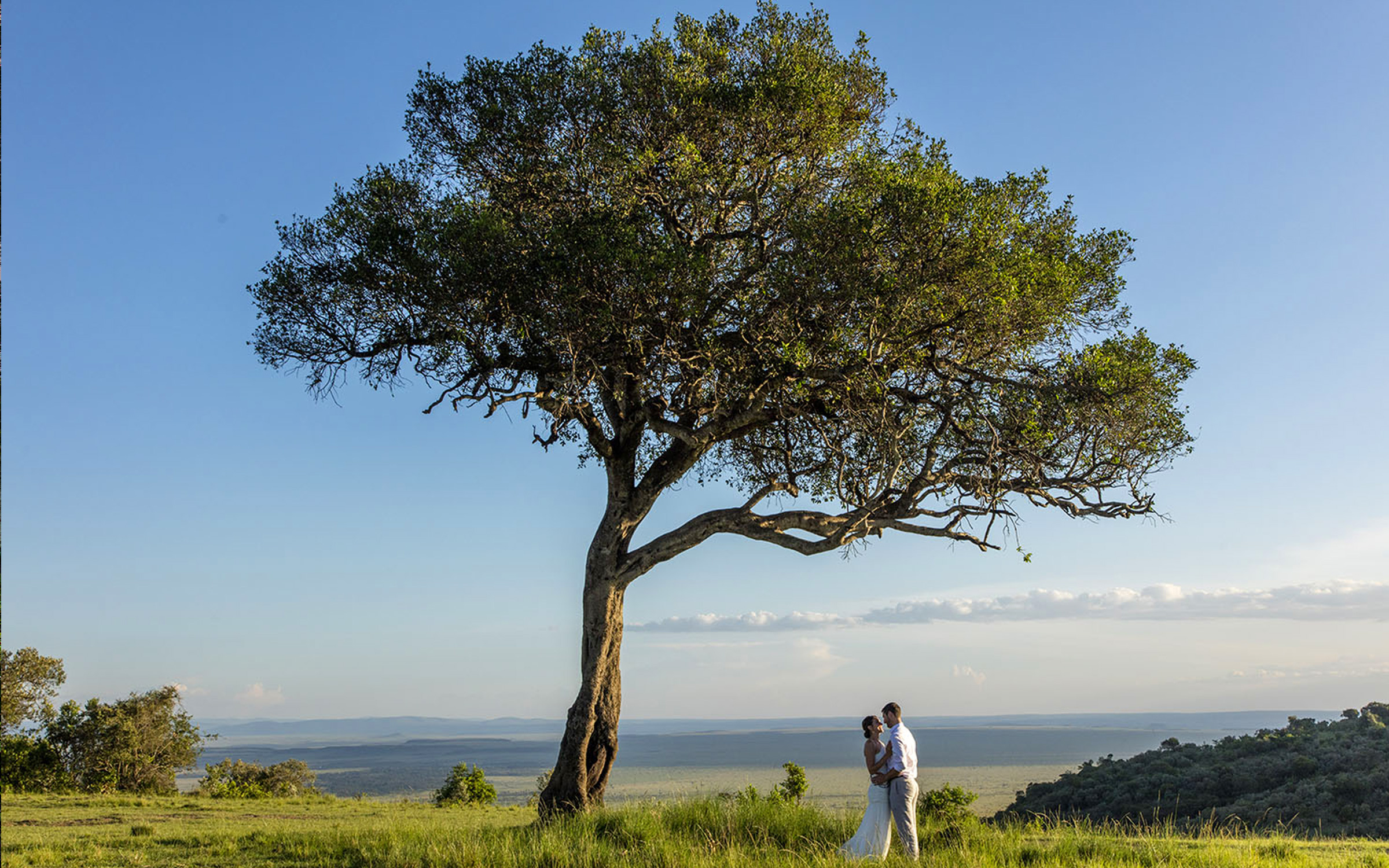 Beautiful couple celebrating - Luxury Kenya Honeymoon Safari