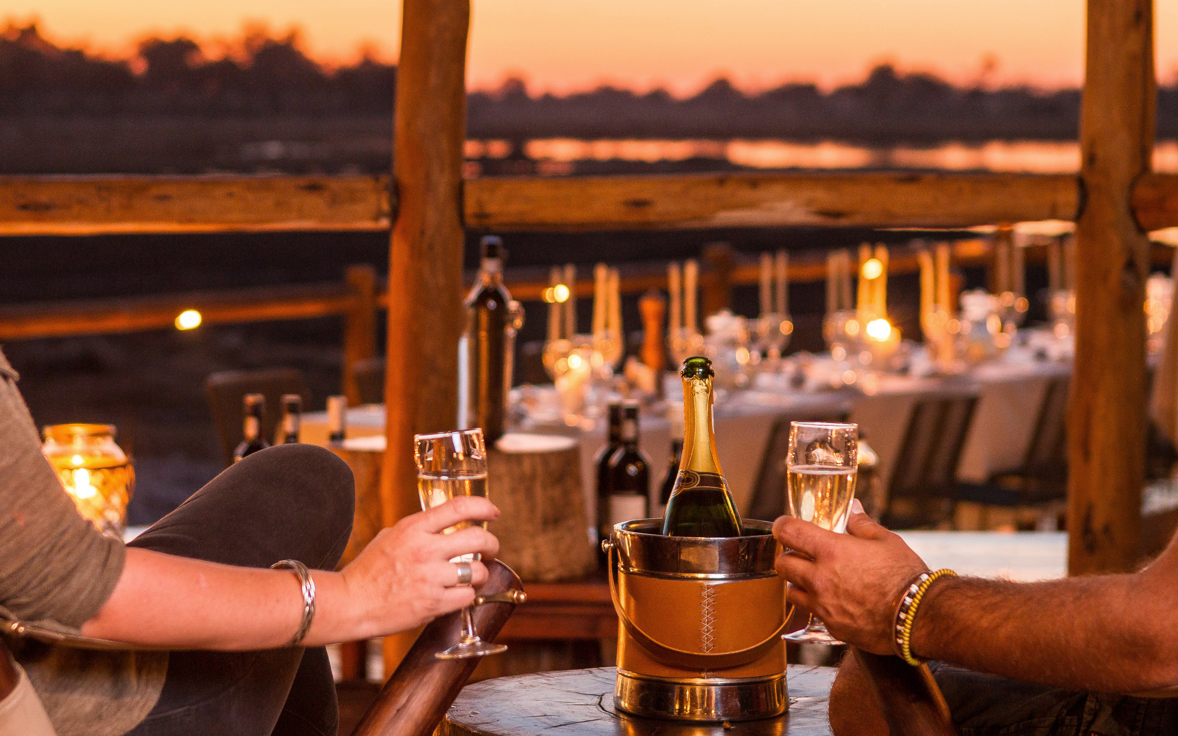 Champagne sundowners on a Desert to Delta Botswana Adventure