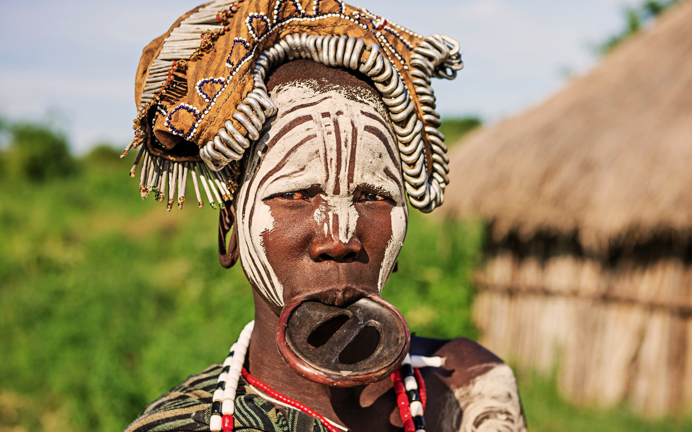 Mursi woman with lip plate - Southern Tribes and Trails of Ethiopia